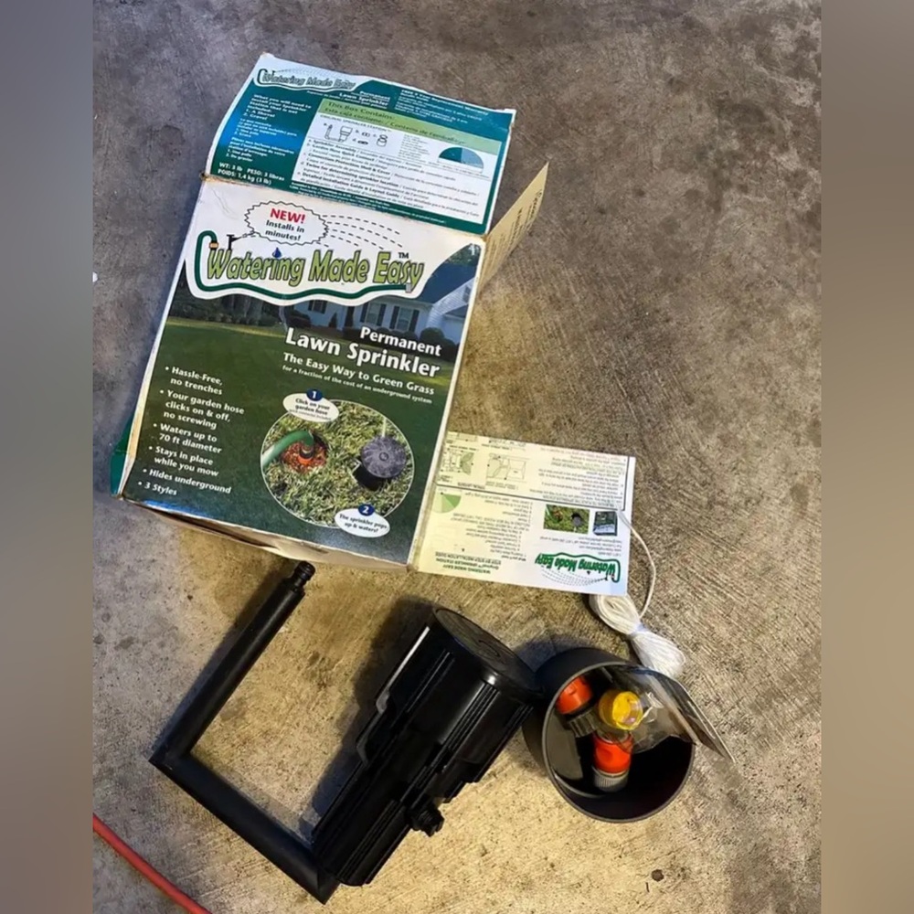 New in box, never installed watering made easy